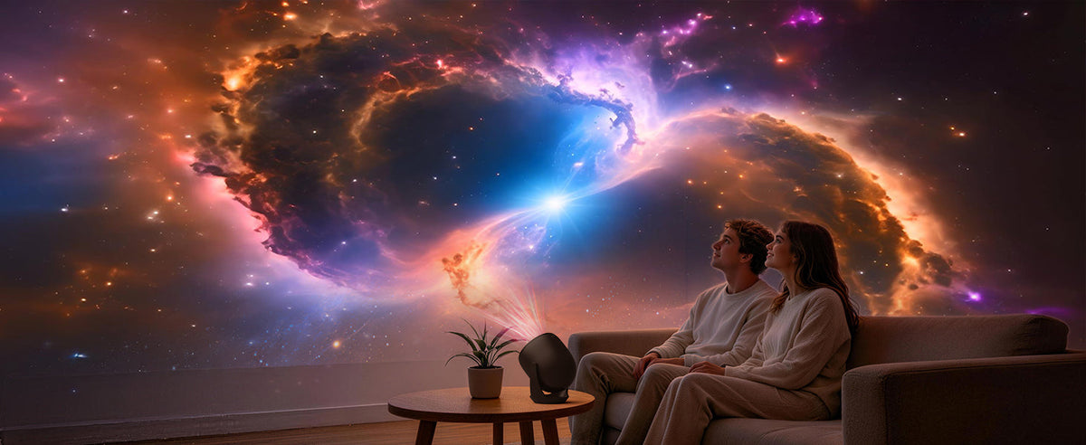 Styled living room with a couple, a black AIRIVO projector, and a colorful nebula scene.